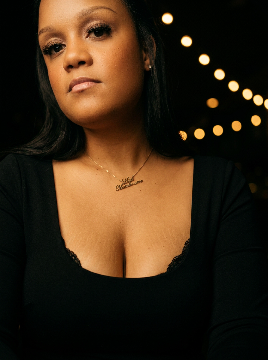 Portrait of your companion in a black gown against warm golden evening lights